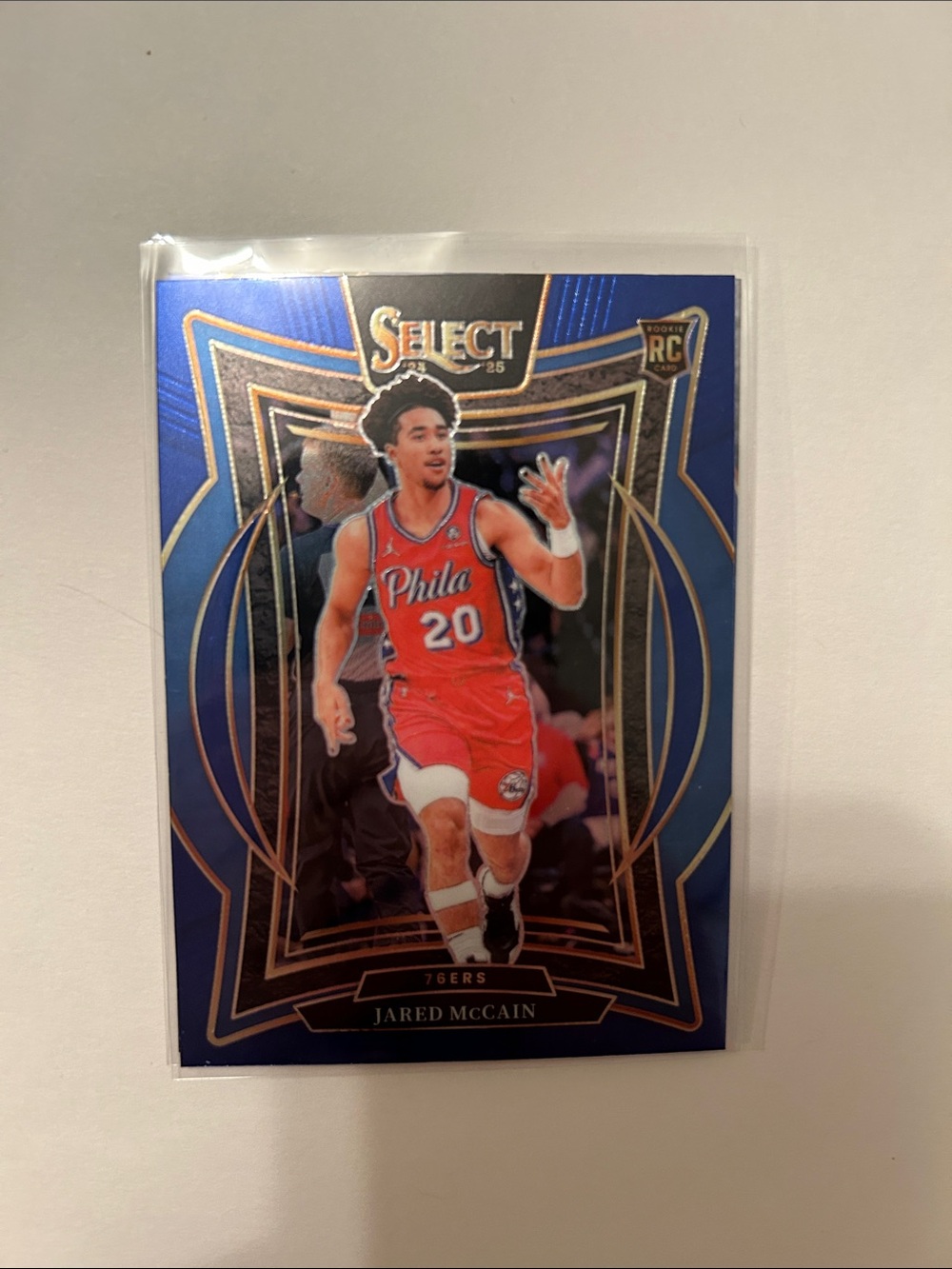 Select Jared McCain Rookie Card - Blue & Gold Parallel